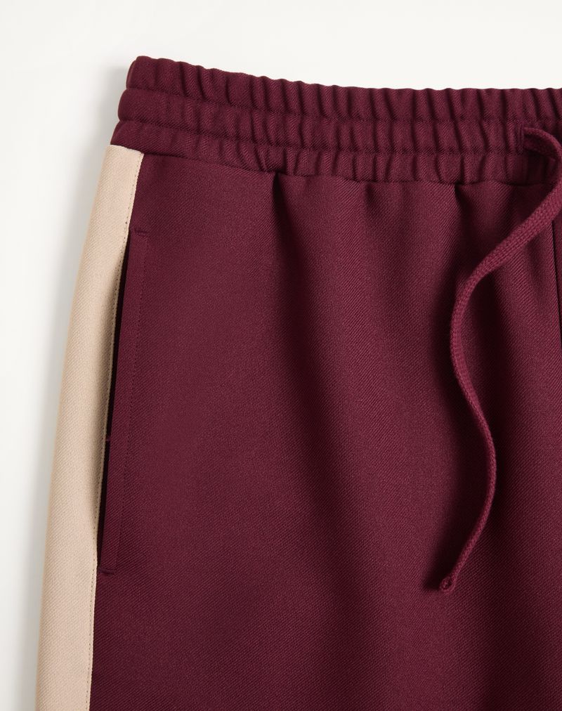 Calças de nylon Valentino com detalhes dourados