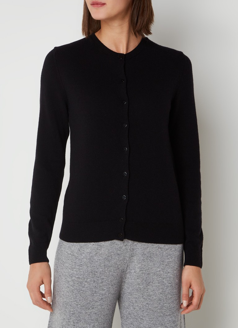 Cardigan Benetton cu guler rotund, confecționat din lână fină.