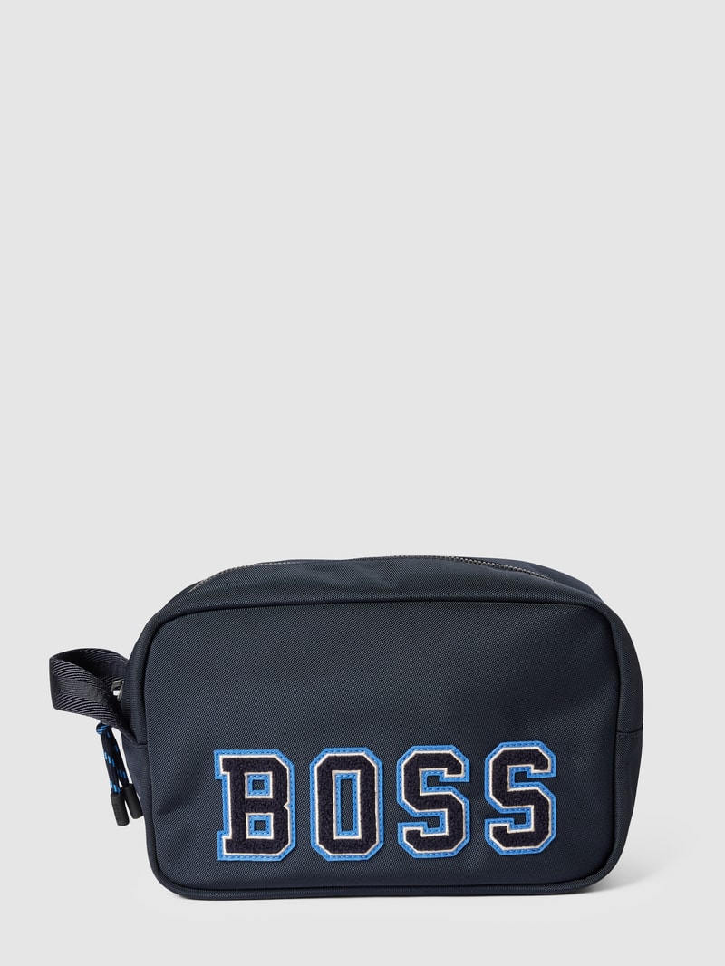 Kulturtasche mit Label-Applikation Modell 'Catch 2.0' in marineblau