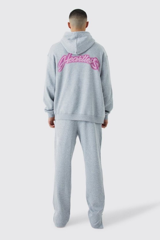Oversize Trainingsanzug mit Heartless-Print und geteiltem Saum