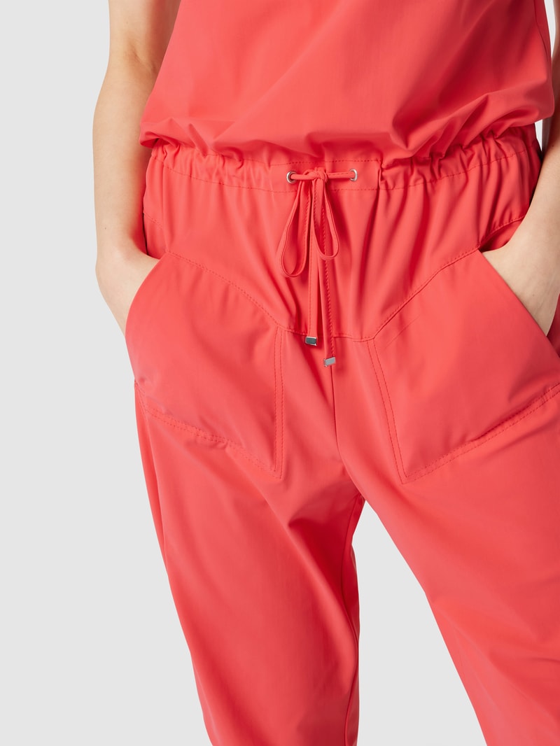 Jumpsuit mit seitlichen Eingrifftaschen Modell GIRA JUMPY in koralle