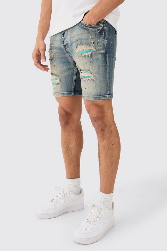 Skinny Stretch PU Jeansshorts mit Farbspritzern und Rissen