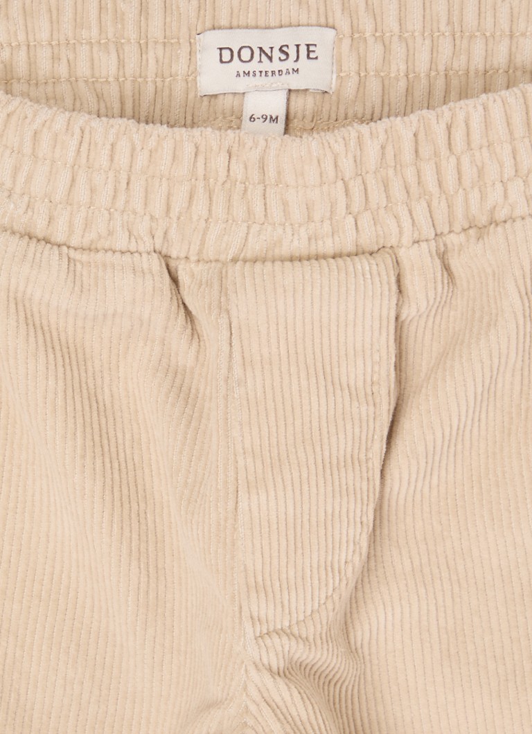Pantaloni drepți Levyn de la Donsje Amsterdam, confecționați din bumbac organic.