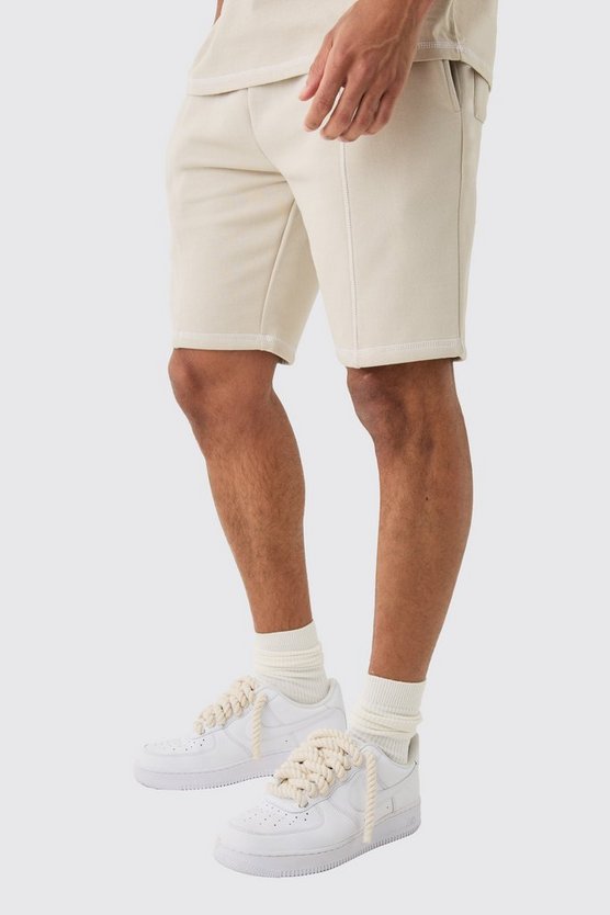 Lockere bestickte Shorts mit Kontrast-Naht