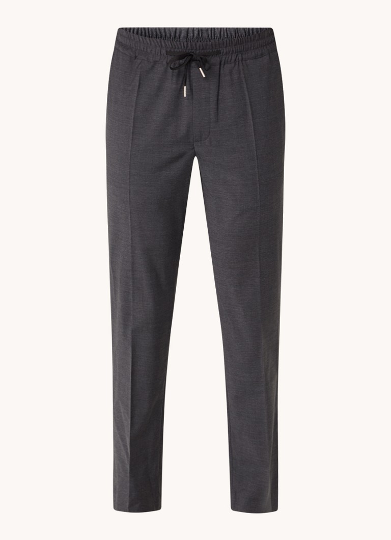 Pantaloni chino Sandro din amestec de lână, cu croială mulată și buzunare laterale.