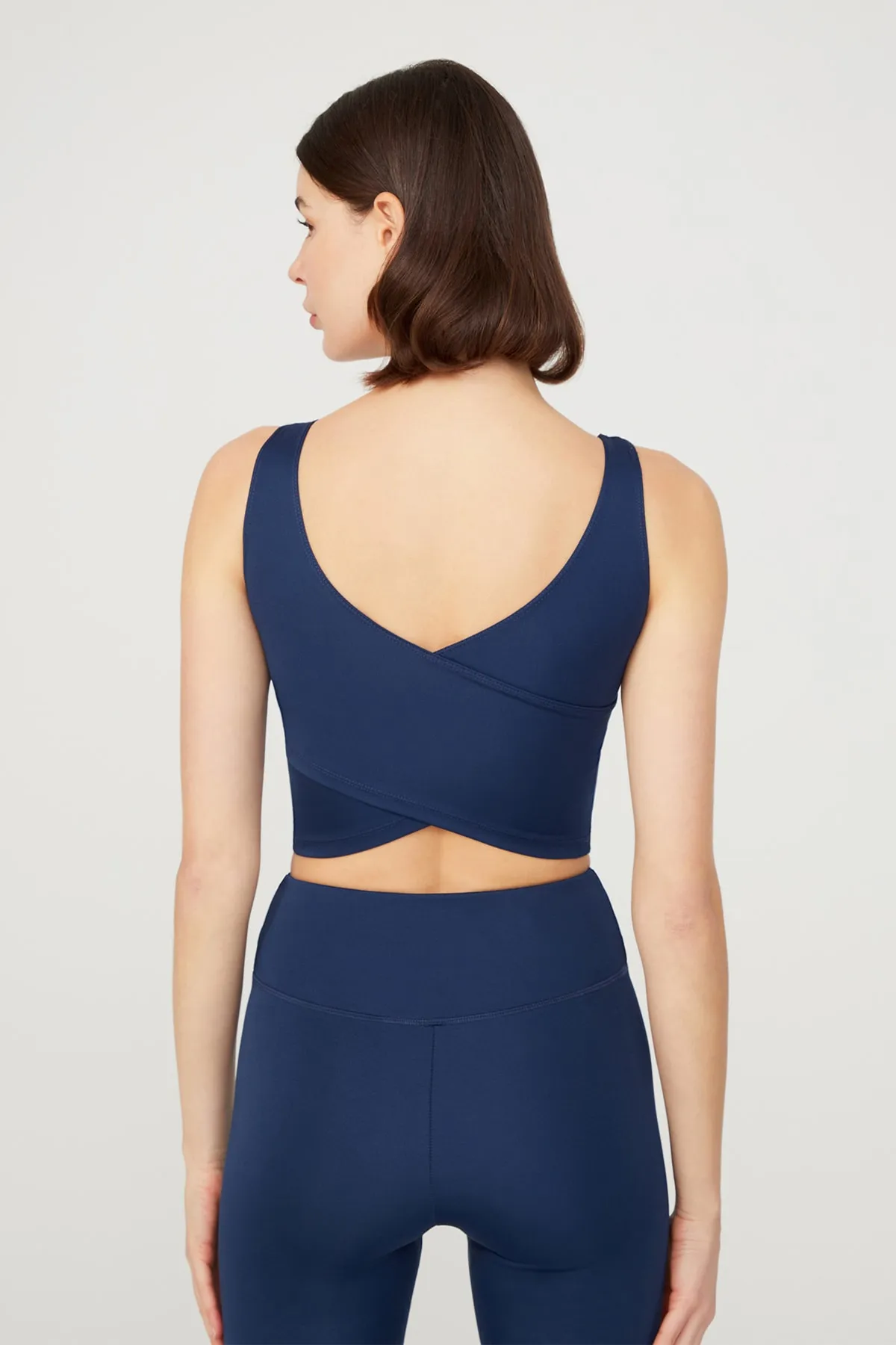 LOS OJOS  Marineblaues, leicht unterstütztes Bustier-Crop-Top mit Ausschnitt am Rücken