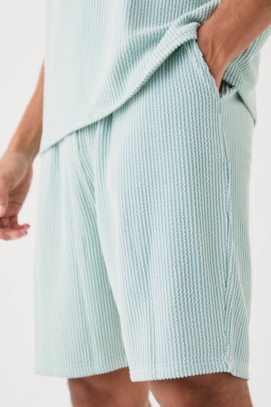 Lockere mittellange strukturierte Shorts mit Streifen