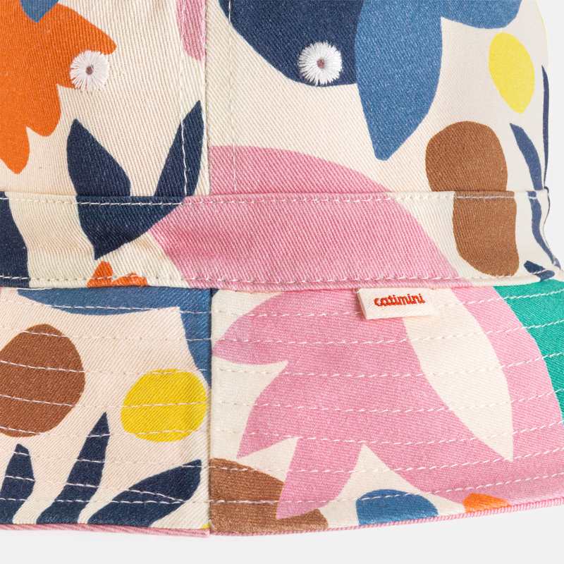Bob réversible bébé fille rose/motifs abstraits Catimini