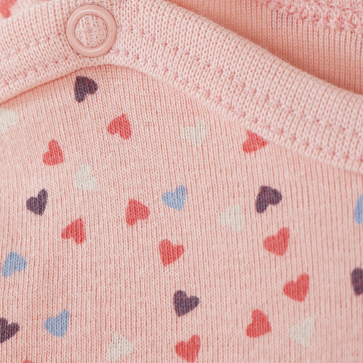 Baby Langarmbody mit Herzchen-Allover