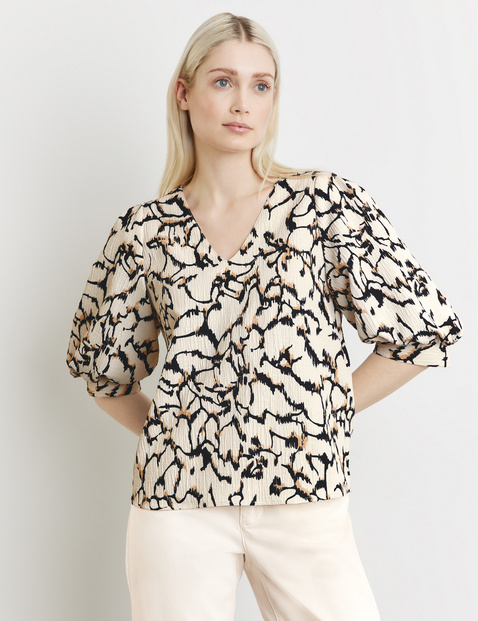 Bluse mit Puffärmeln
