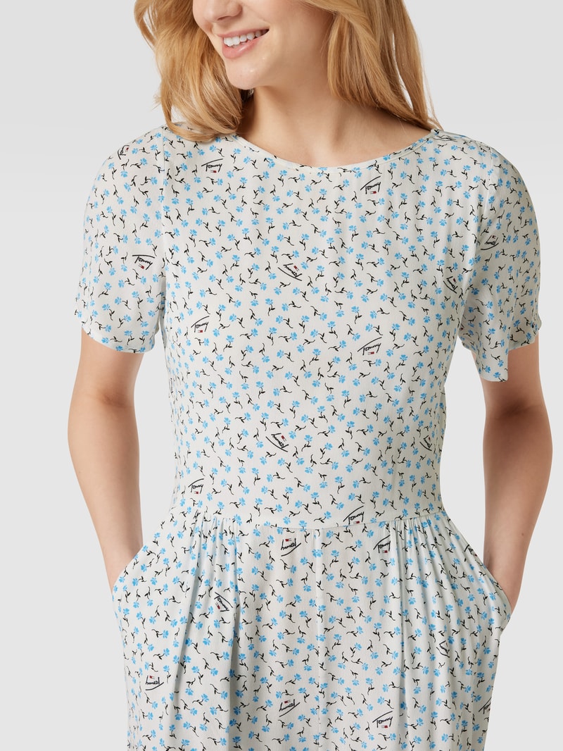 Jumpsuit mit floralem Muster in weiß