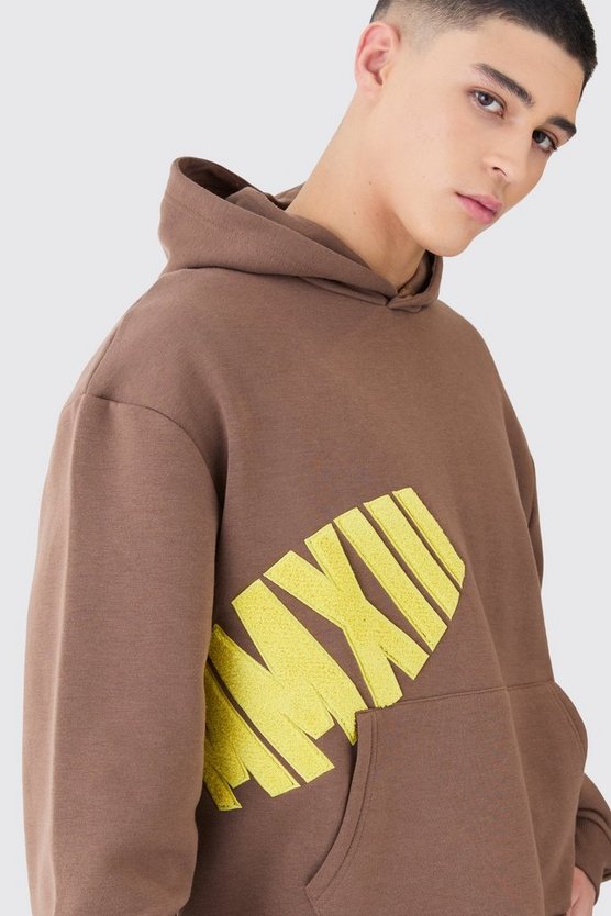 Kastiger Oversize Hoodie mit Borg-Applikation