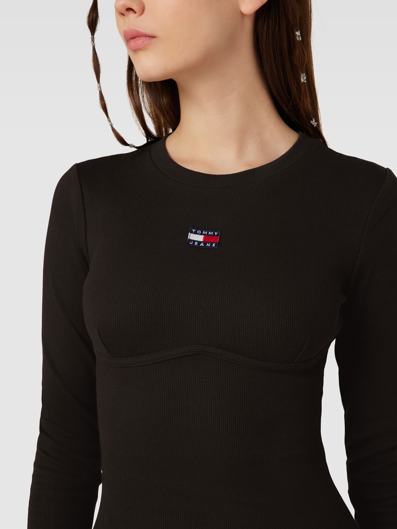 Sweatkleid in Ripp-Optik in schwarz