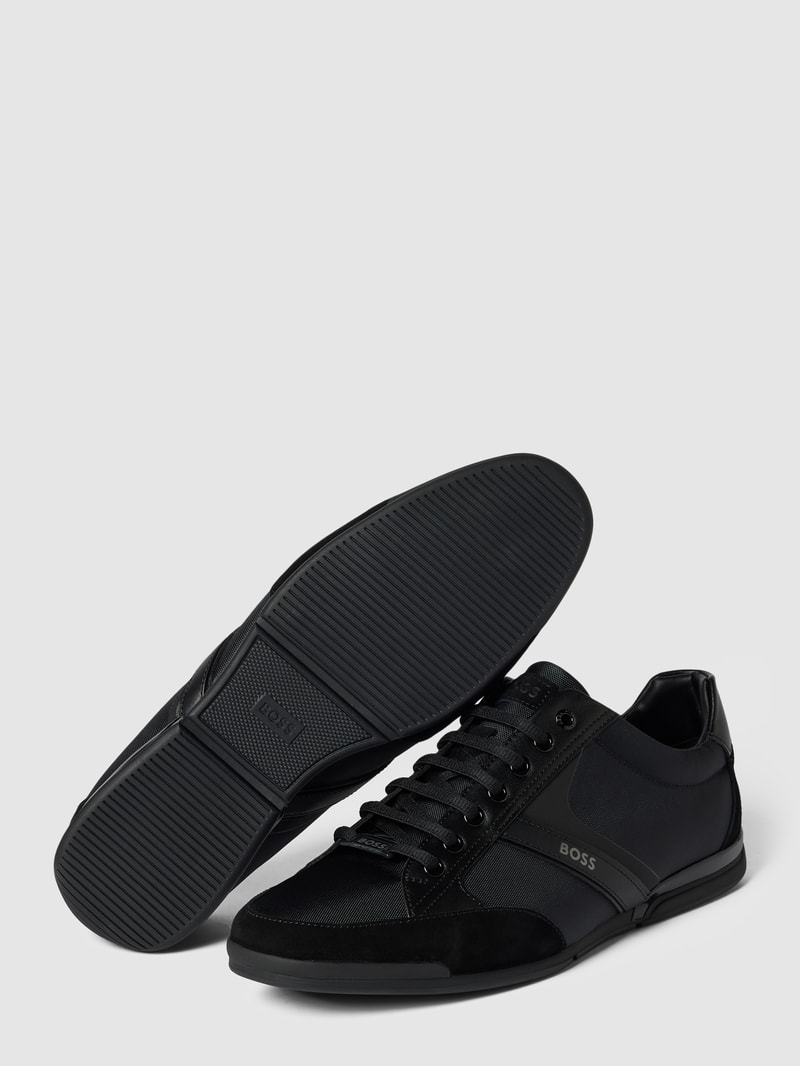 Sneaker aus Leder-Mix in schwarz