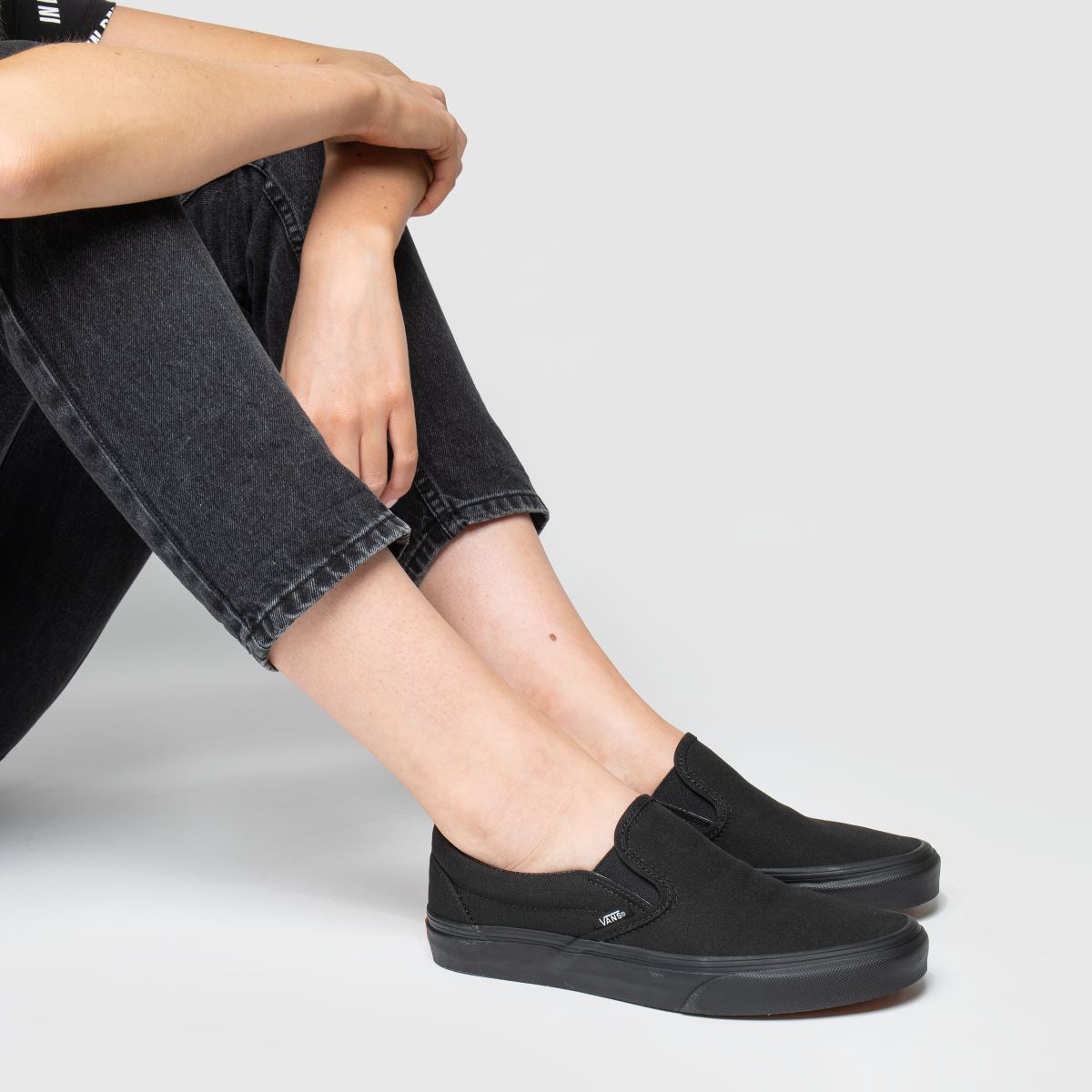 Vans – Svarta klassiska slip-on iii-sneakers
