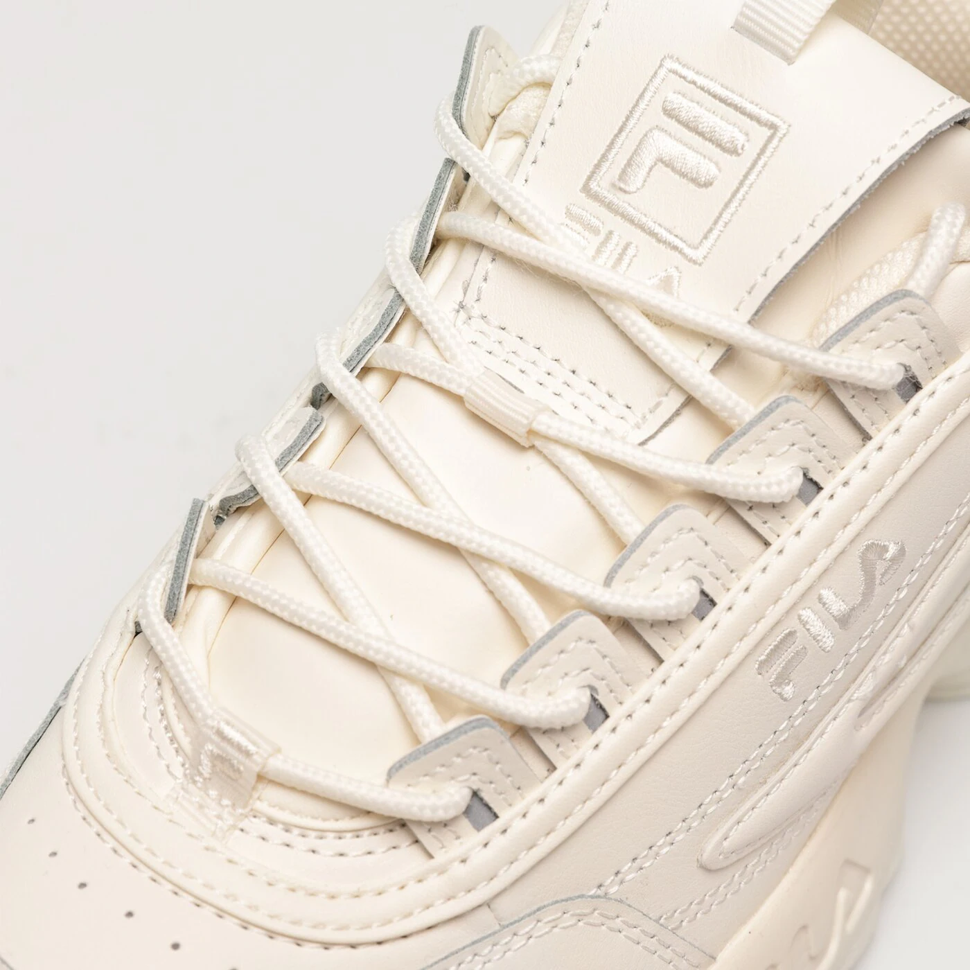 FILA DISRUPTOR II PREMIUM Kremowy