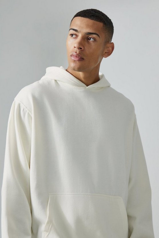 Man Active Oversize Hoodie mit Train Mean Slogan