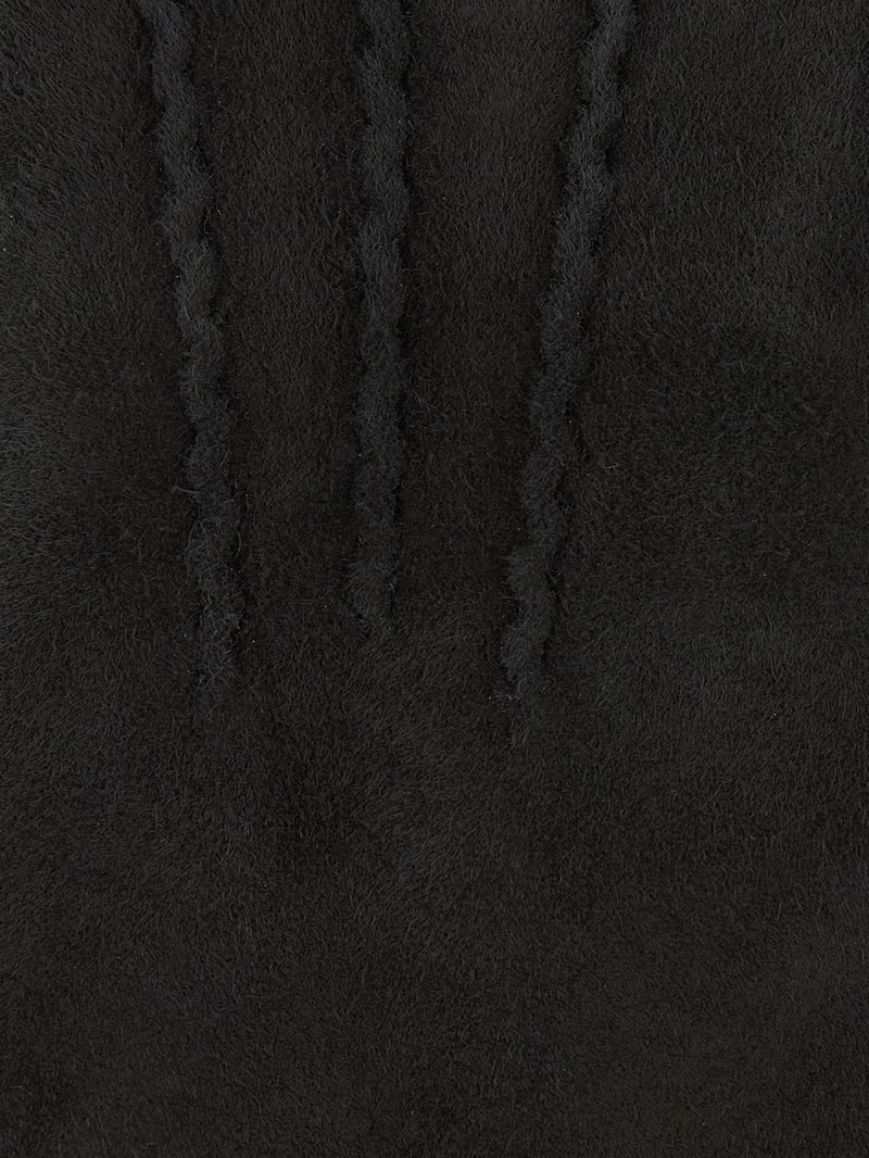 Handschuhe aus Lammshearling in schwarz