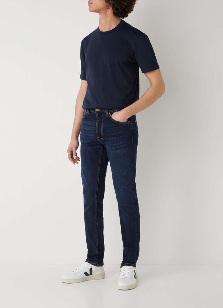 Blugi Nudie Lean Dean, croială slim, culoare închisă, uzați.