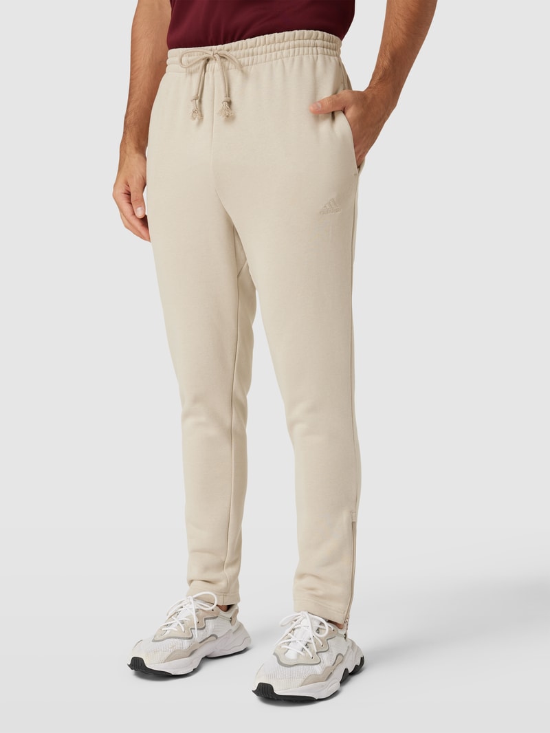 Sweatpants mit Label-Stitching in beige