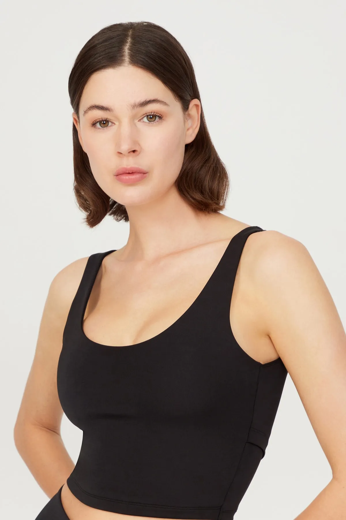 LOS OJOS  Schwarzes, leicht unterstütztes Bustier-Crop-Top mit Ausschnitt am Rücken