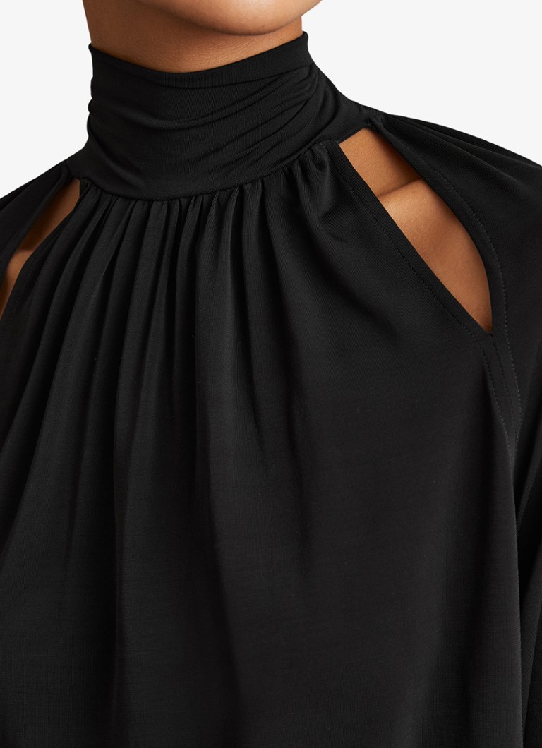 Top Reiss Adrienne con collo alto e dettagli traforati.