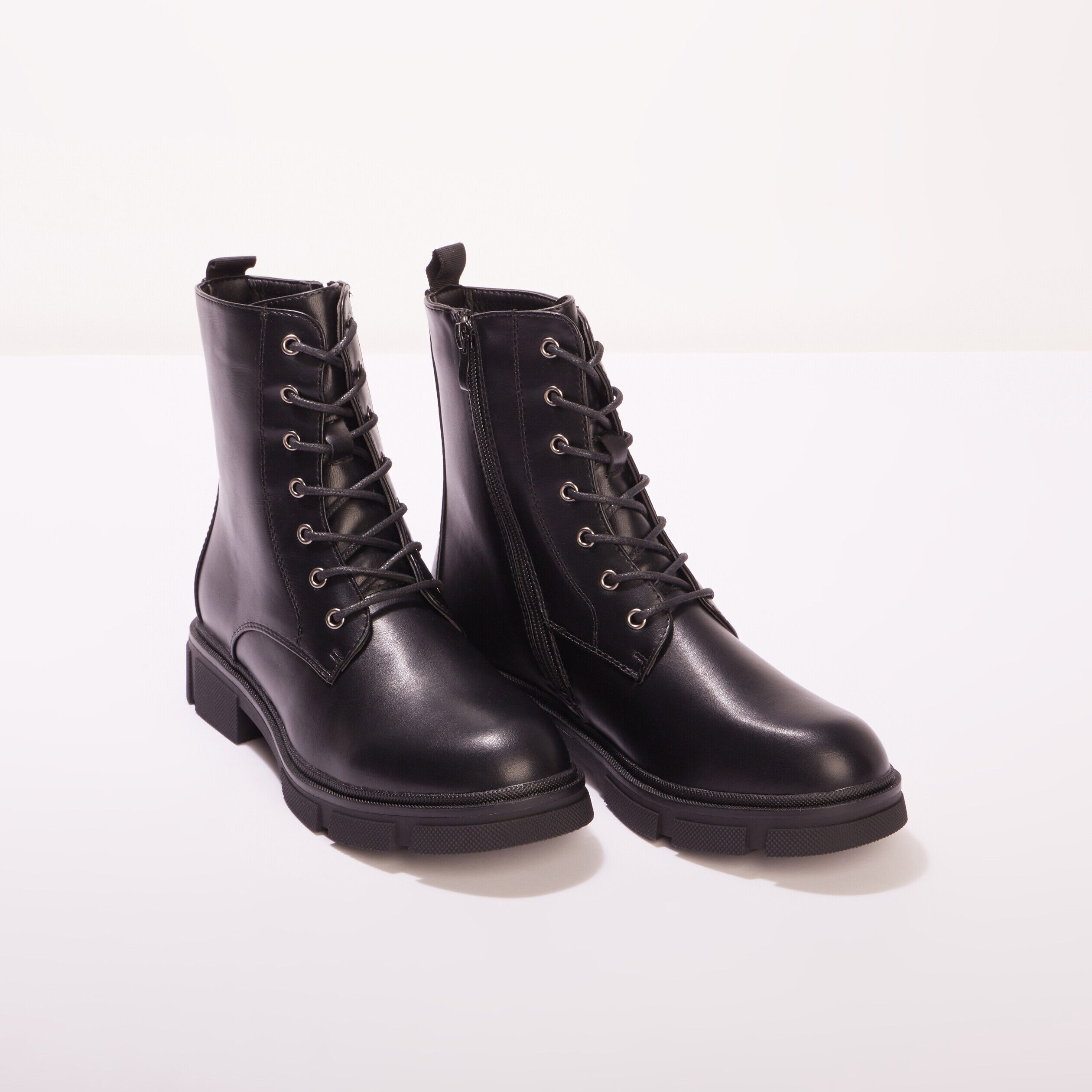 Bottines crantées zippées noir femme | Cache Cache