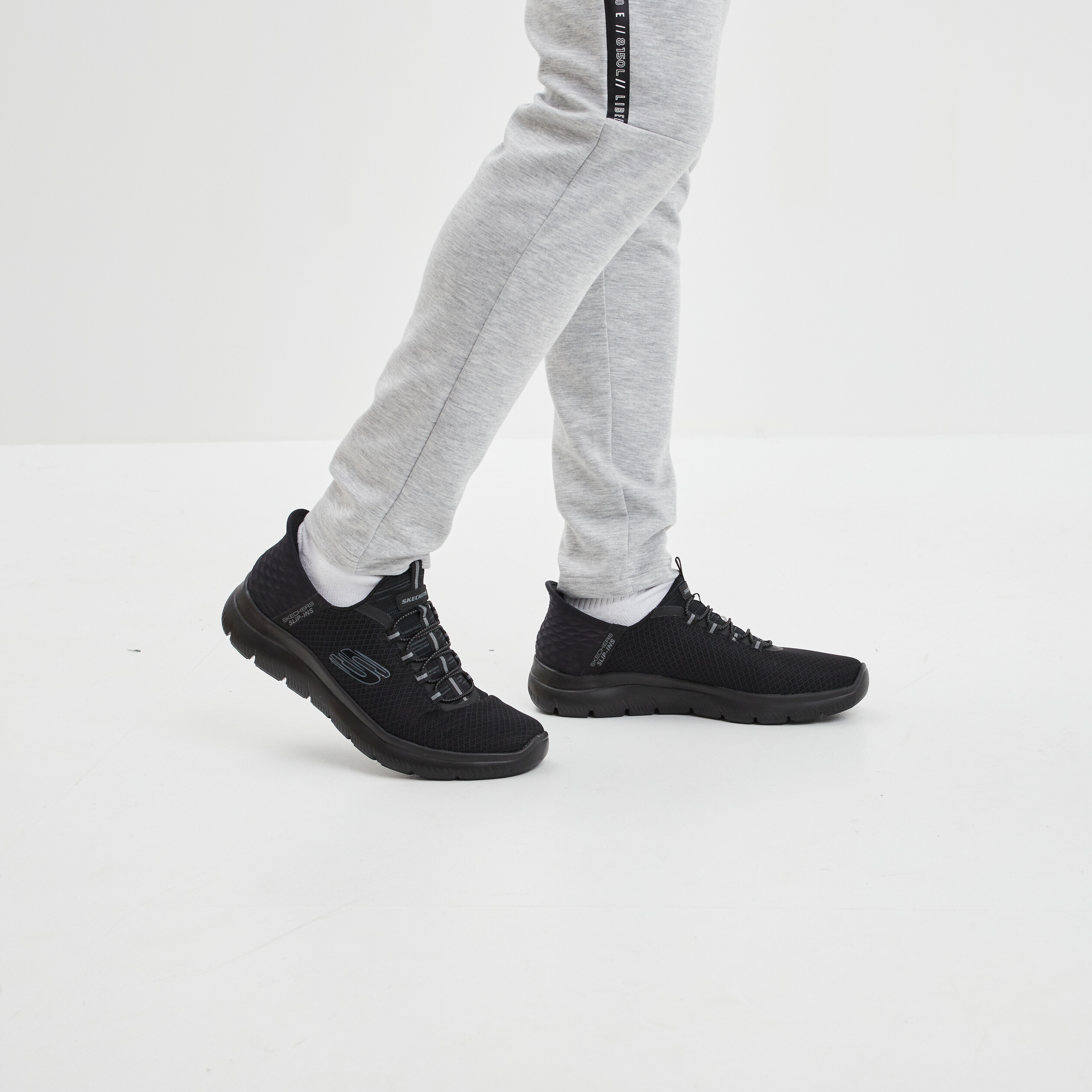 Baskets running mémoire forme Skechers noir homme | La Halle