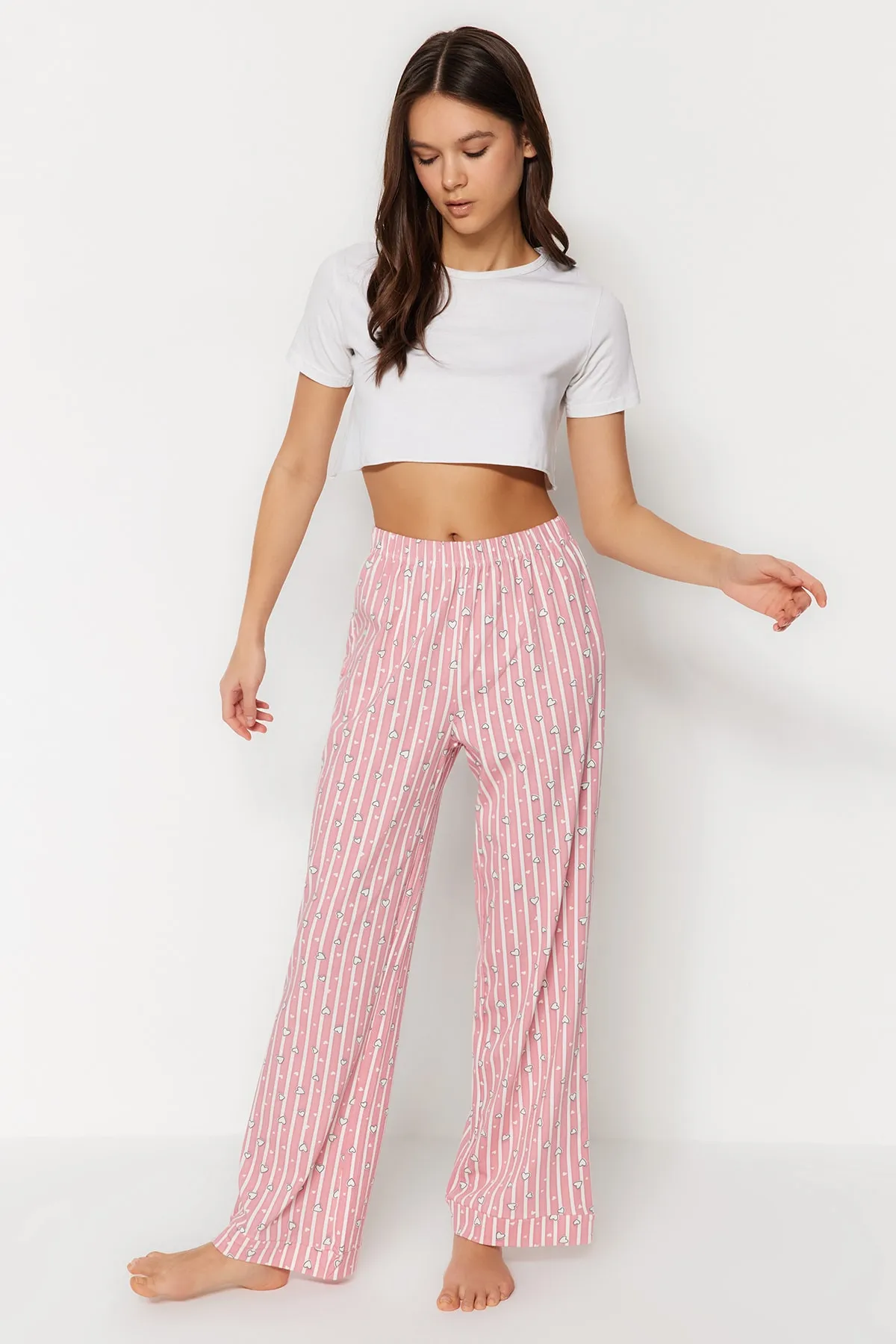 Trendyol Collection  Gestreifte gestrickte Pyjamahose aus rosa Baumwolle THMSS23PJ00002