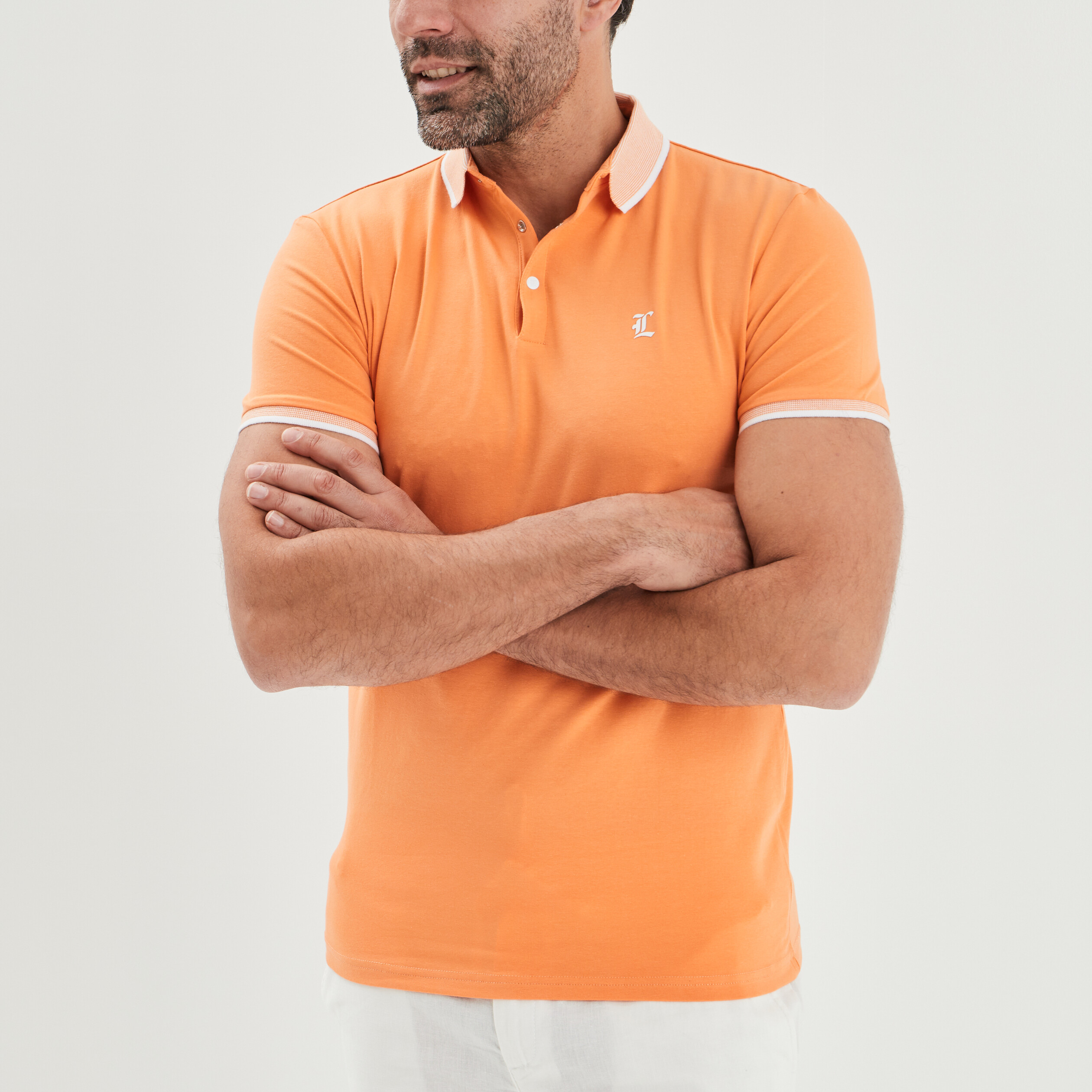 Polo ajusté manches courtes orange clair homme | La Halle