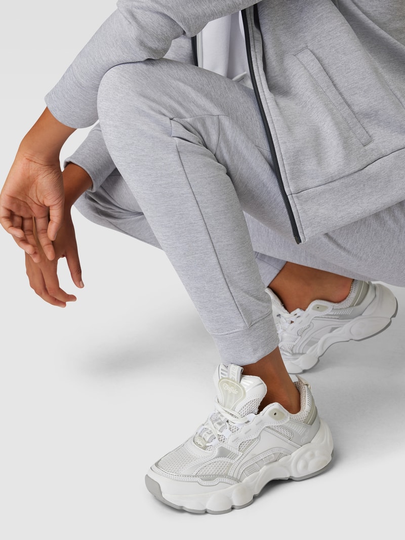 Sweatpants mit Label-Print Modell 'REAXION' in hellgrau meliert