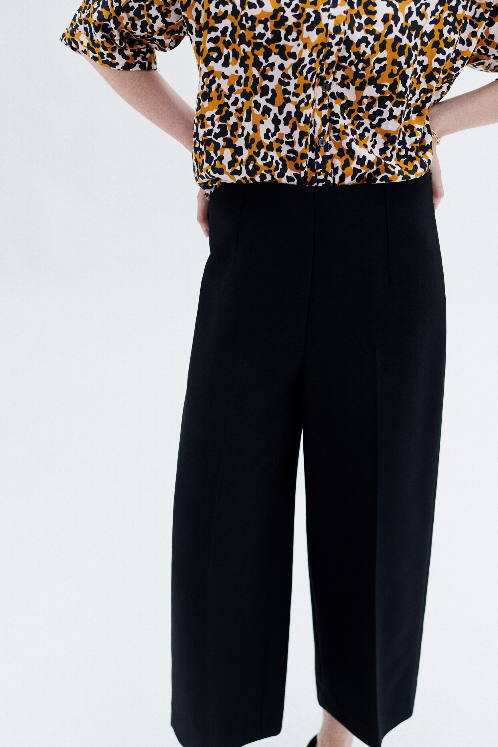 Pantalon pierce noir femme