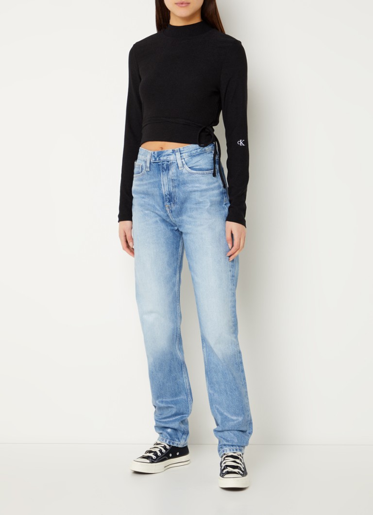 Jeans Calvin Klein a vita alta e vestibilità slim, lavaggio medio.