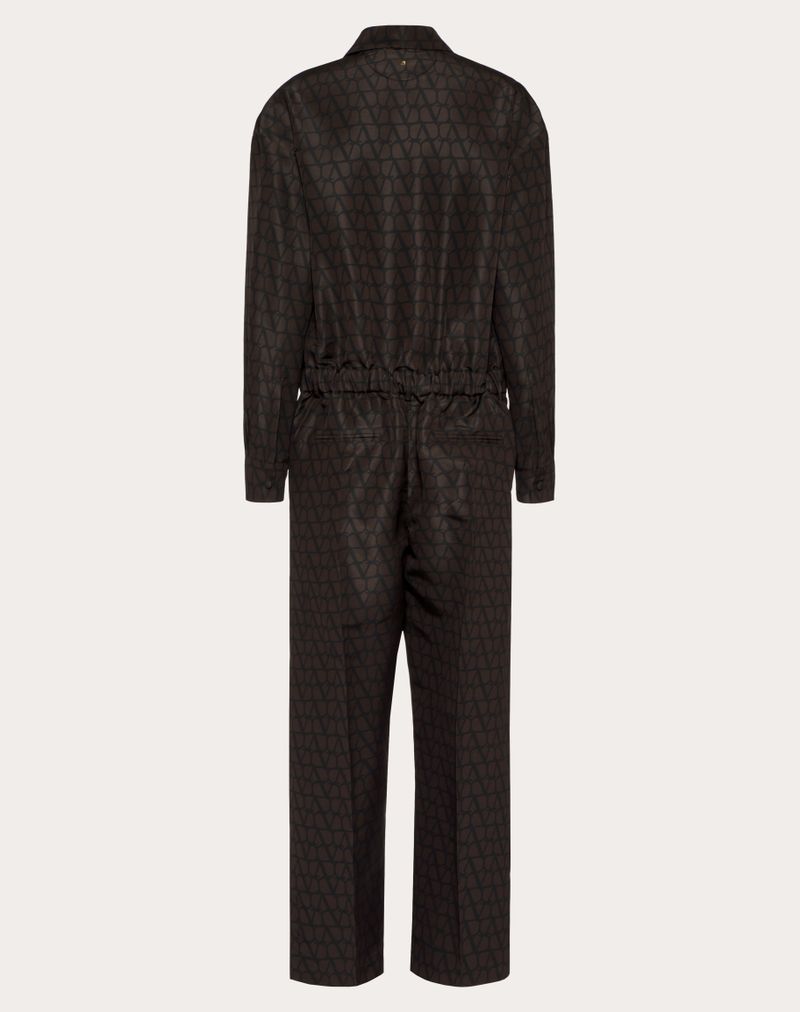 Zijden jumpsuit met een opvallende, volledig bedrukte iconografie.