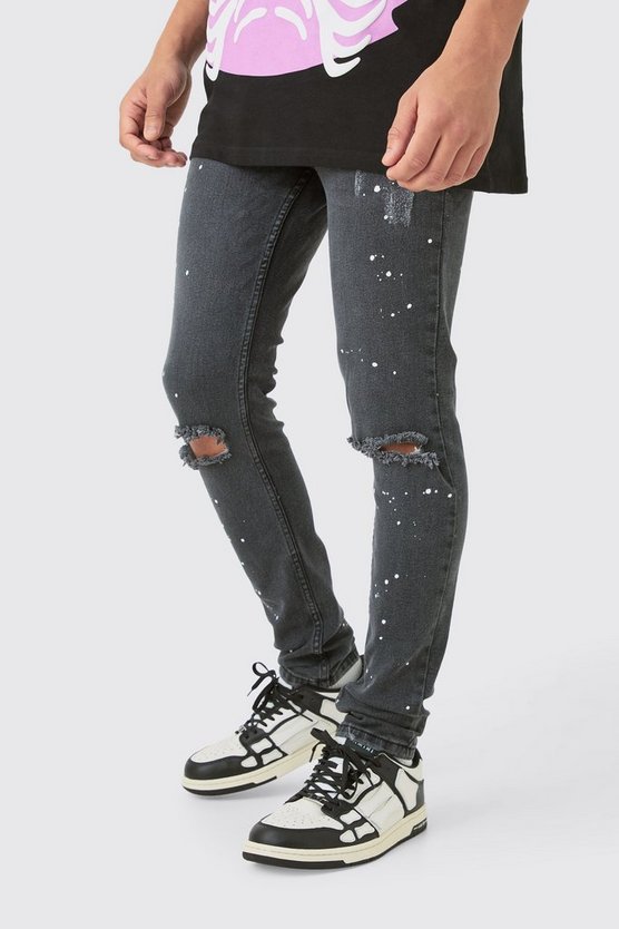 Zerrissene Skinny Stretch Jeans mit Farbspritzern