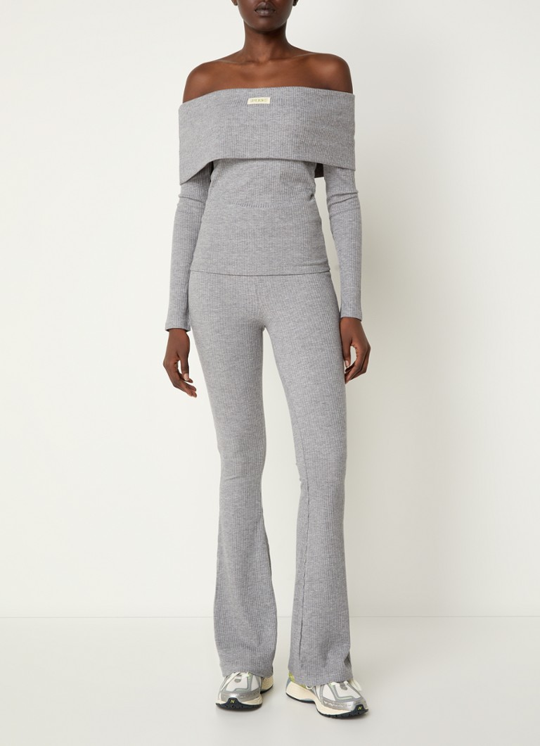 Legginsy Luke z wysokim stanem, rozszerzanymi nogawkami i ściągaczem marki Refined Department, zdobione lureksem.