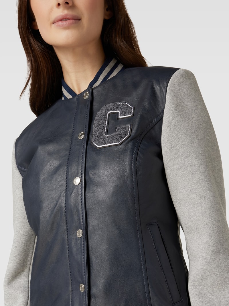 Collegejacke mit Lederbesatz in marineblau