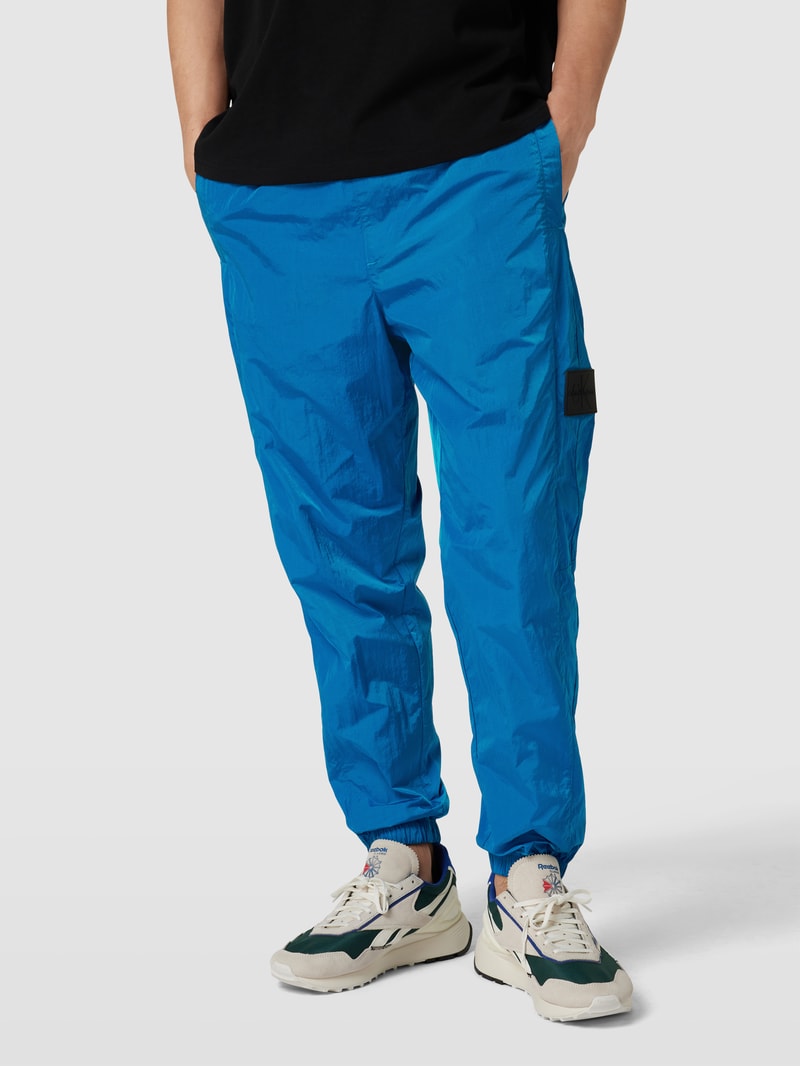 Stoffhose mit elastischen Abschlüssen in royalblau