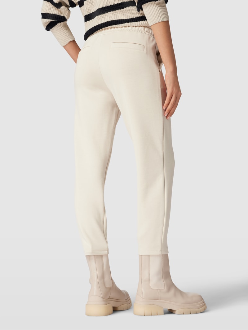 Sweatpants mit Paspeltaschen am Gesäß in ecru