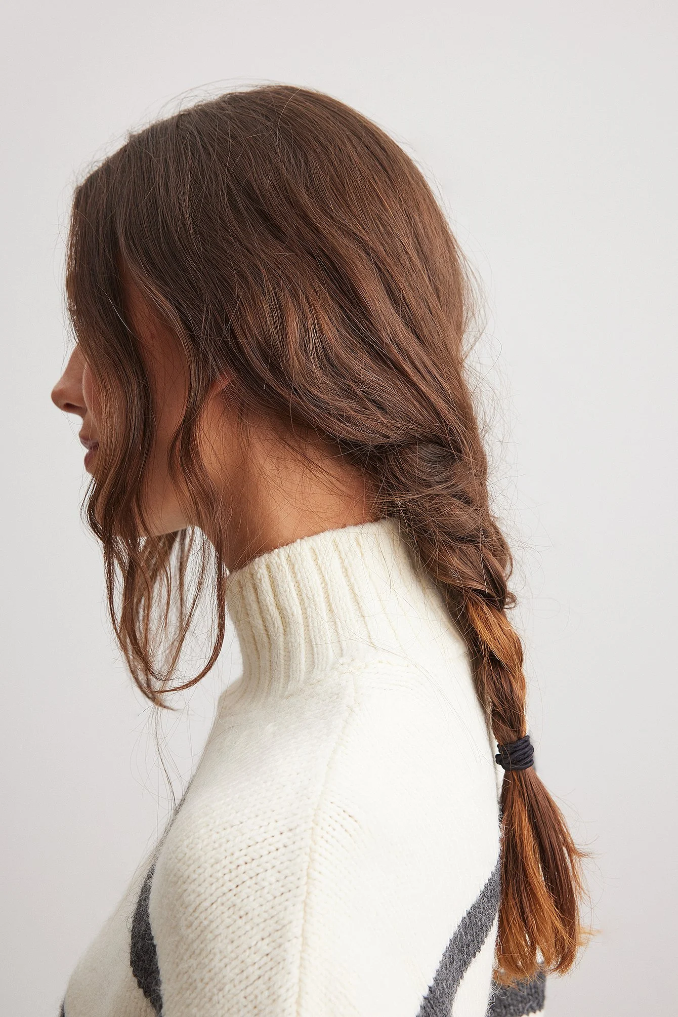 Gestreifter Strickpullover mit Rollkragen