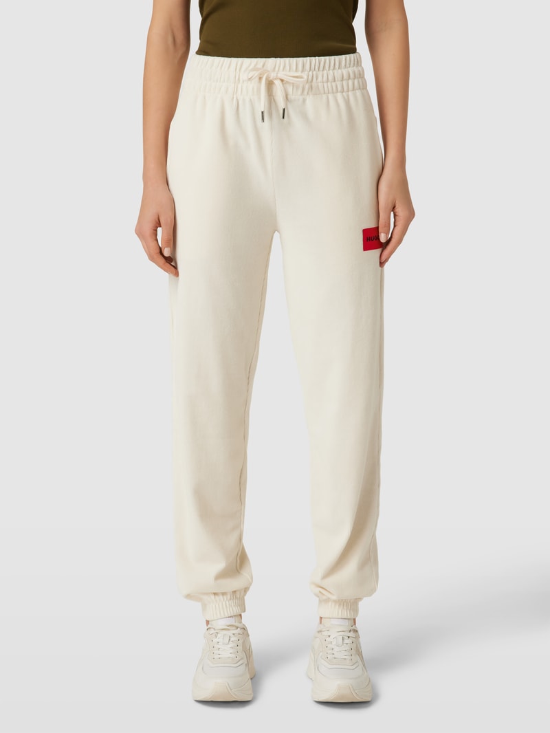 Regular Fit Hose aus Samt mit Label-Patch in offwhite
