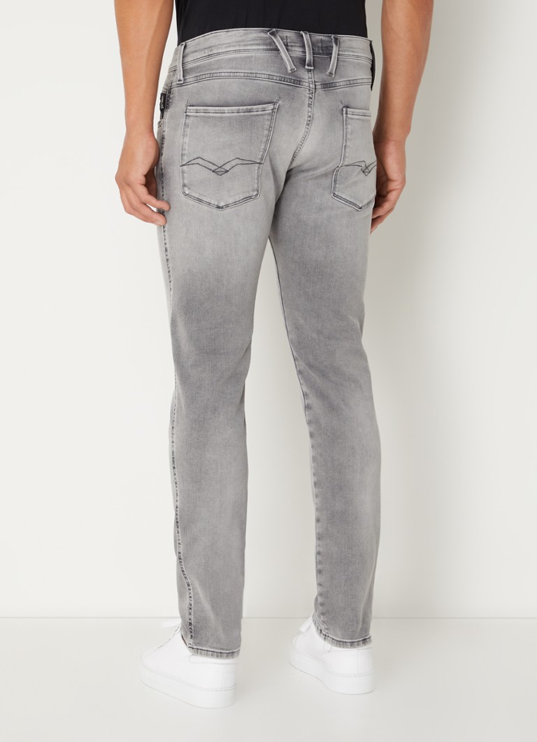 Calça jeans Replay Anbass slim fit com lavagem média