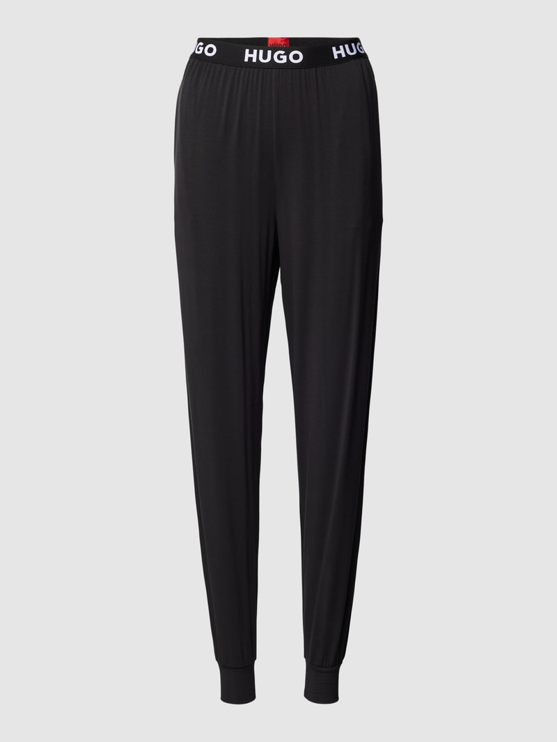Sweatpants mit elastischem Logo-Bund Modell 'UNITE' in schwarz