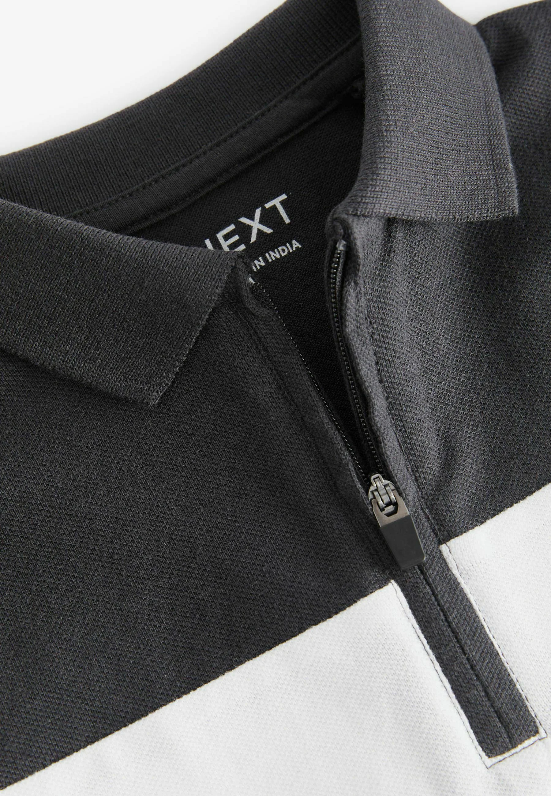 Siguiente Polo de manga corta y corte regular