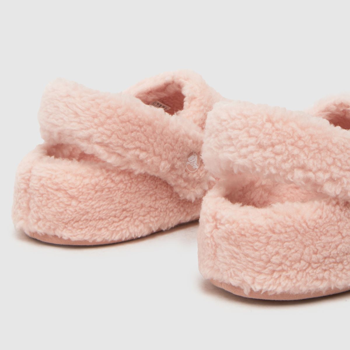 Crocs ljusrosa klassiska Cozzzy flicktofflor