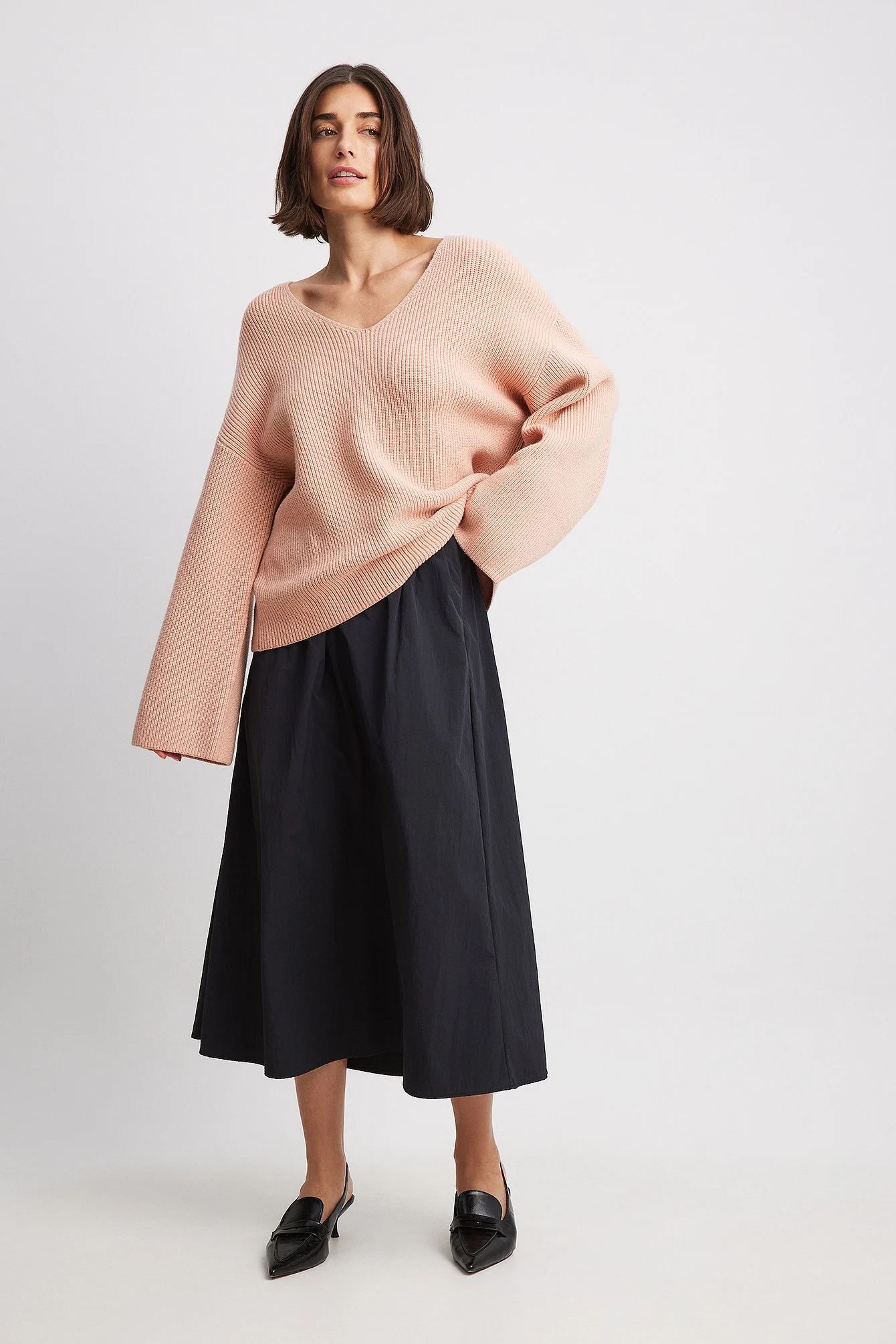 V-Ausschnitt Strickpullover