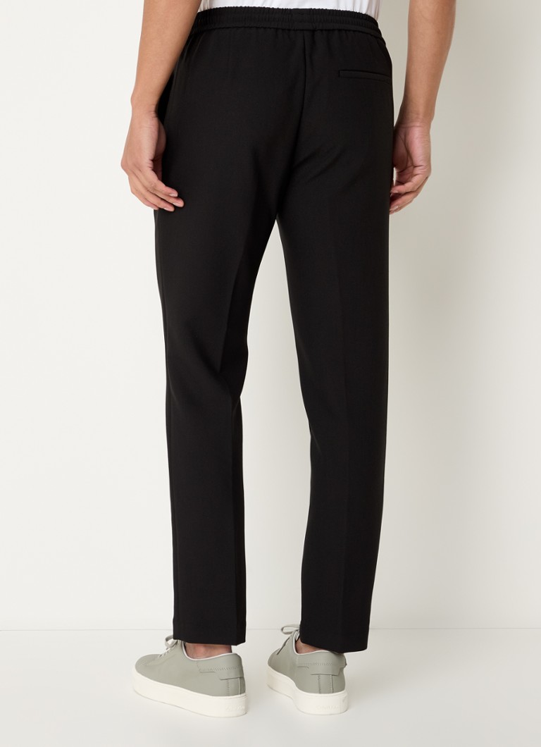 Calvin Klein slim fit trousers with pressed crease and drawstring