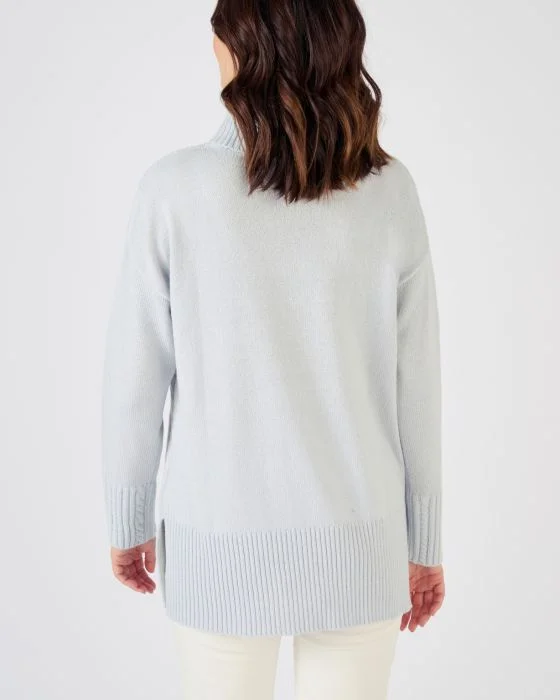 Pull col roulé à torsades