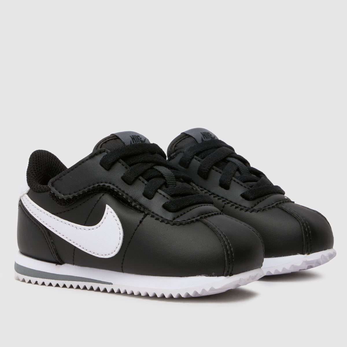 Nike svarta och vita Cortez småbarnsskor