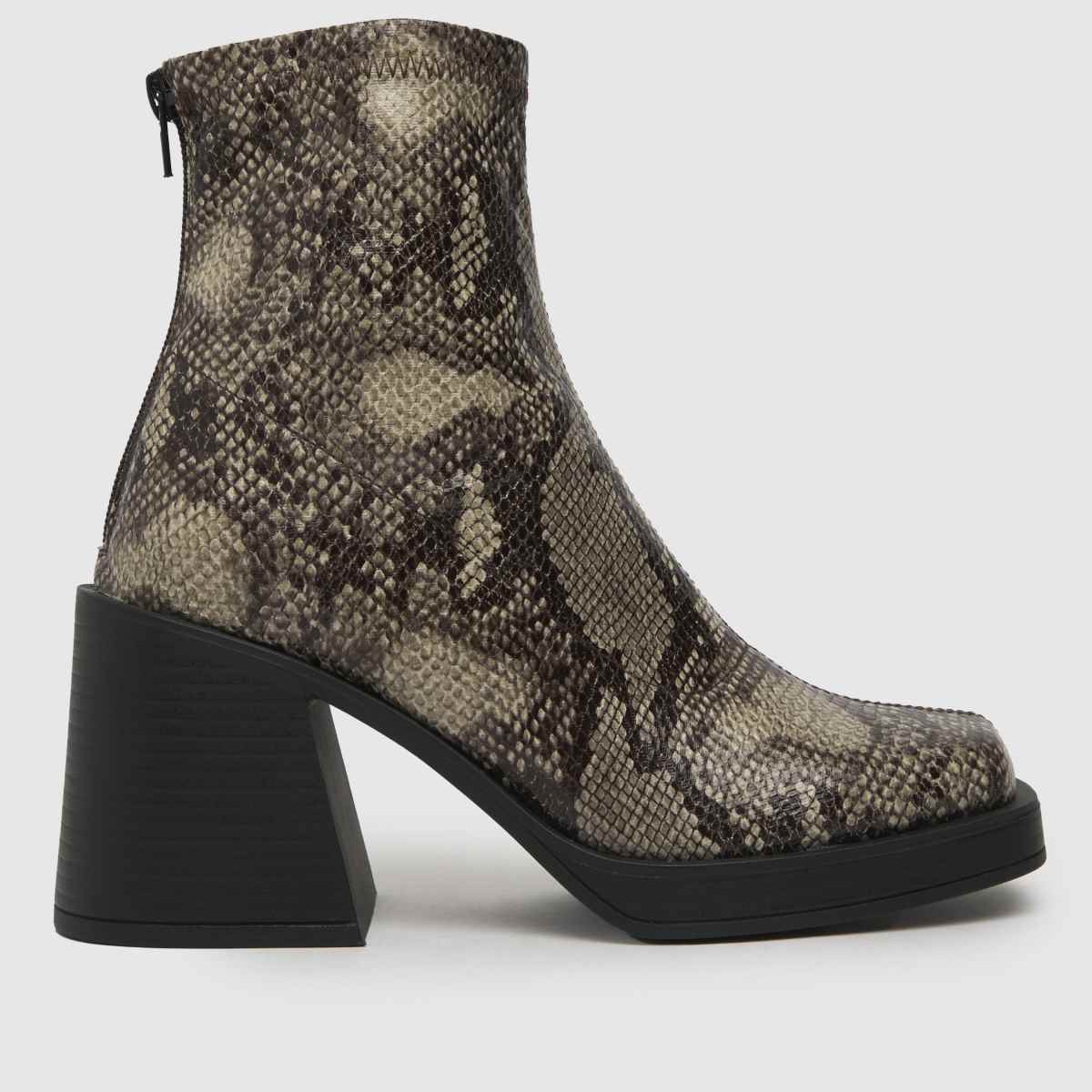 Schuh Brielle – Beige och bruna platåstövlar med stretch